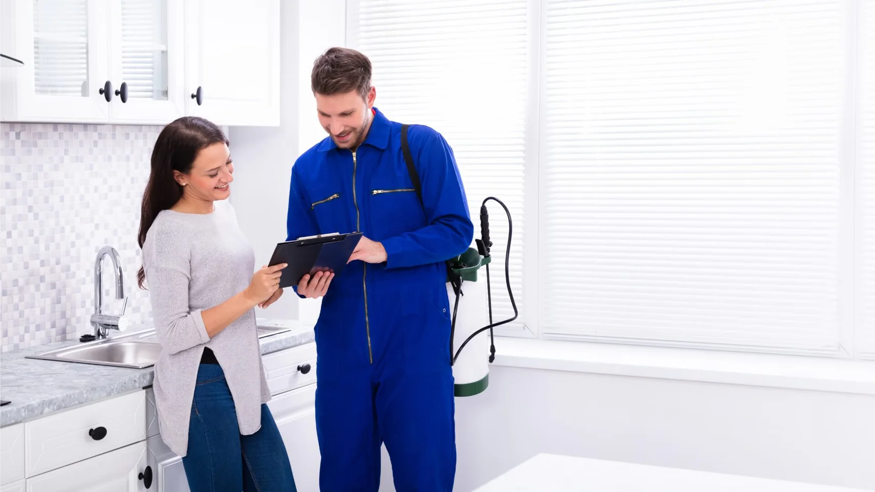 Pest control expert with customer